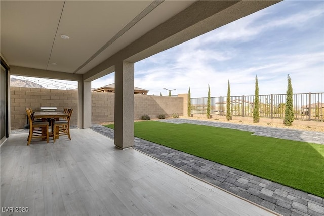 view of patio featuring outdoor dining space