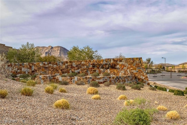 community sign featuring a mountain view
