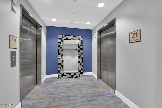 200 W Sahara Ave Unit 603, Las Vegas, NV 89102 - corridor with elevator, wood finished floors, baseboards, and recessed lighting