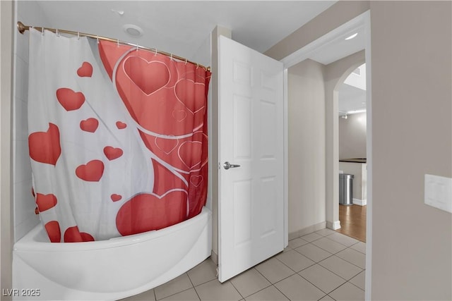 200 W Sahara Ave Unit 603, Las Vegas, NV 89102 - full bath featuring tile patterned floors, shower / tub combo with curtain, and baseboards