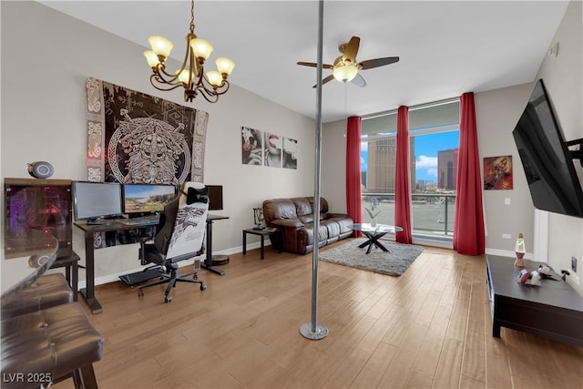 200 W Sahara Ave Unit 603, Las Vegas, NV 89102 - office area featuring ceiling fan, wood finished floors, a chandelier, and baseboards