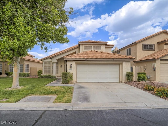 5452 Big Sky Ln, Las Vegas, NV 89149 - mediterranean / spanish-style house with an attached garage, stucco siding, a front yard, driveway, and a tile roof