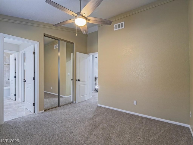 5452 Big Sky Ln, Las Vegas, NV 89149 - unfurnished bedroom featuring carpet, baseboards, a closet, ornamental molding, and ceiling fan