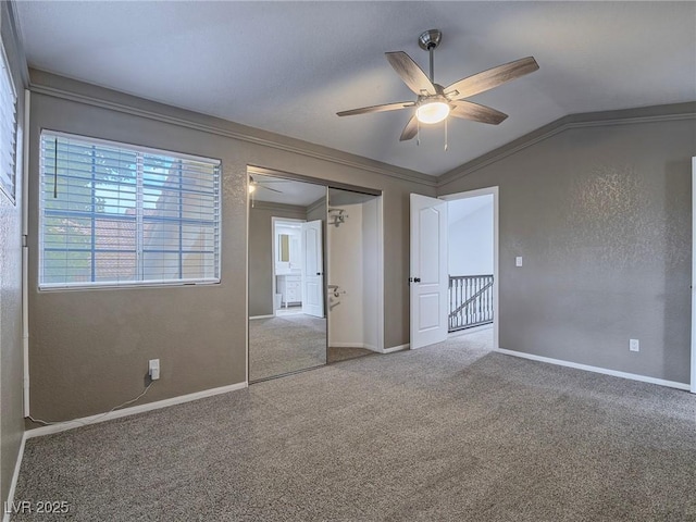 5452 Big Sky Ln, Las Vegas, NV 89149 - carpeted spare room featuring a ceiling fan, crown molding, lofted ceiling, and baseboards