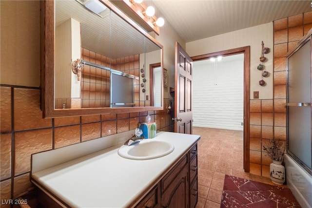 1320 Daytona St, Pahrump, NV 89048 - full bathroom with vanity, tile patterned flooring, and combined bath / shower with glass door