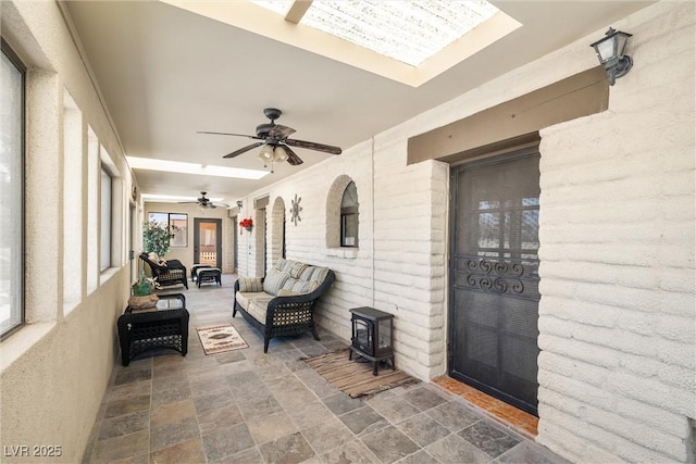1320 Daytona St, Pahrump, NV 89048 - sunroom with a wood stove and a skylight