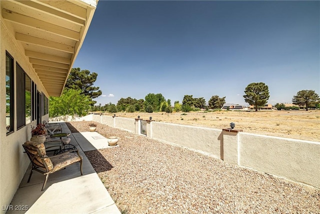 1320 Daytona St, Pahrump, NV 89048 - view of yard with a patio and fence