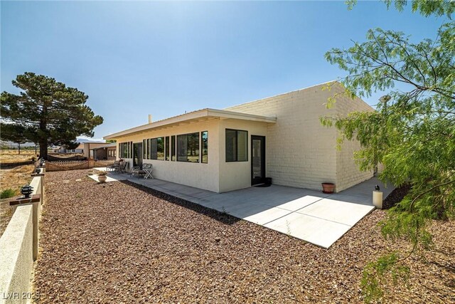1320 Daytona St, Pahrump, NV 89048 - back of property featuring a patio
