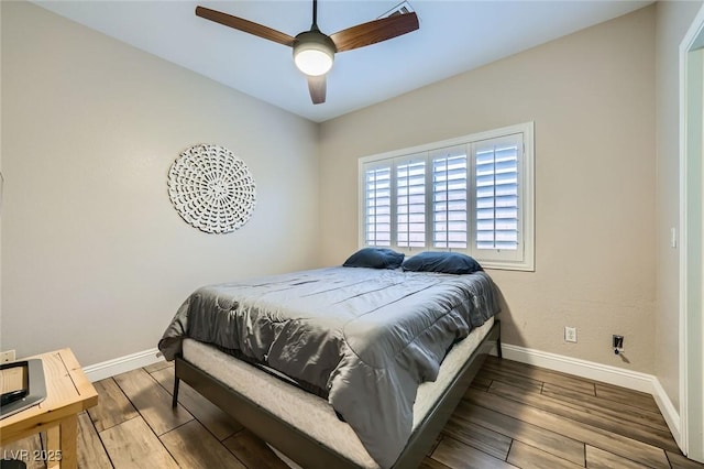 5638 Wild Olive St, Las Vegas, NV 89118 - bedroom featuring baseboards, wood finished floors, and ceiling fan
