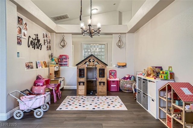 5638 Wild Olive St, Las Vegas, NV 89118 - playroom featuring a chandelier, lofted ceiling, wood finished floors, and baseboards