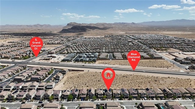 aerial perspective of suburban area with mountains
