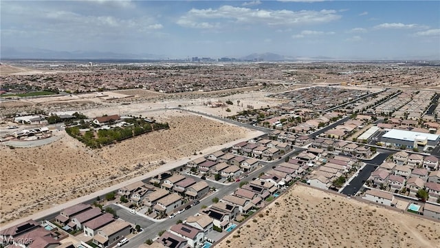 aerial perspective of suburban area featuring a desert landscape