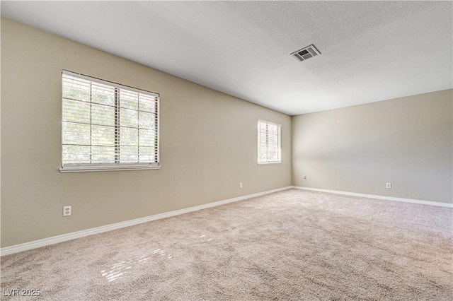 1620 Yellow Rose St, Las Vegas, NV 89108 - carpeted spare room featuring baseboards and a textured ceiling