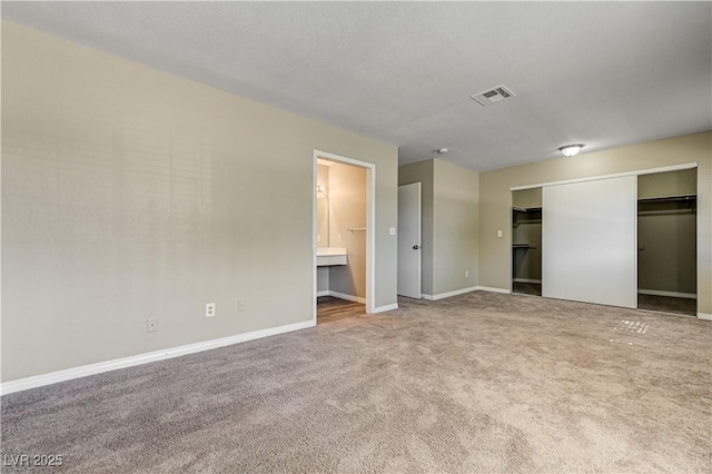 1620 Yellow Rose St, Las Vegas, NV 89108 - unfurnished bedroom featuring carpet flooring, baseboards, and ensuite bath