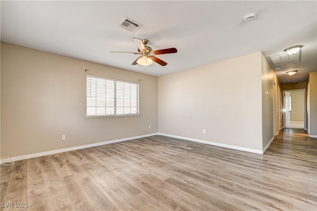 1620 Yellow Rose St, Las Vegas, NV 89108 - unfurnished room featuring a ceiling fan, light wood-style floors, and baseboards
