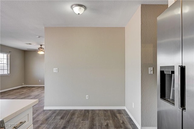 1620 Yellow Rose St, Las Vegas, NV 89108 - unfurnished room with ceiling fan, dark wood-type flooring, and baseboards