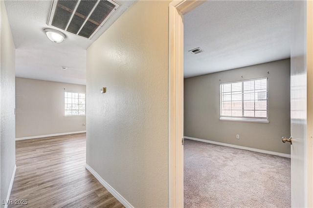 1620 Yellow Rose St, Las Vegas, NV 89108 - corridor featuring baseboards and wood finished floors