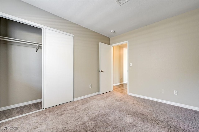 1620 Yellow Rose St, Las Vegas, NV 89108 - unfurnished bedroom with carpet, a closet, baseboards, and lofted ceiling
