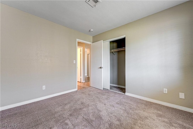 1620 Yellow Rose St, Las Vegas, NV 89108 - unfurnished bedroom featuring light carpet, baseboards, and a closet