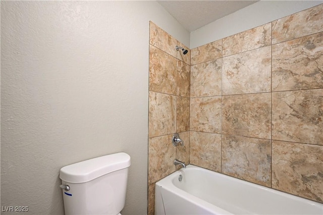 1620 Yellow Rose St, Las Vegas, NV 89108 - full bathroom featuring bathtub / shower combination, toilet, and a textured wall