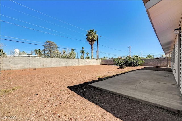 1620 Yellow Rose St, Las Vegas, NV 89108 - fenced backyard with a patio