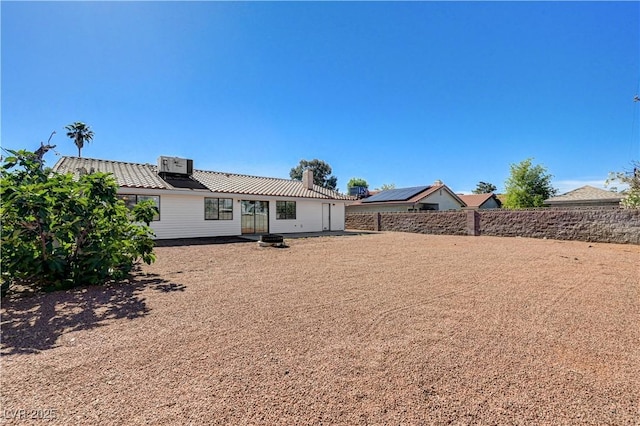 1620 Yellow Rose St, Las Vegas, NV 89108 - rear view of property with a tiled roof