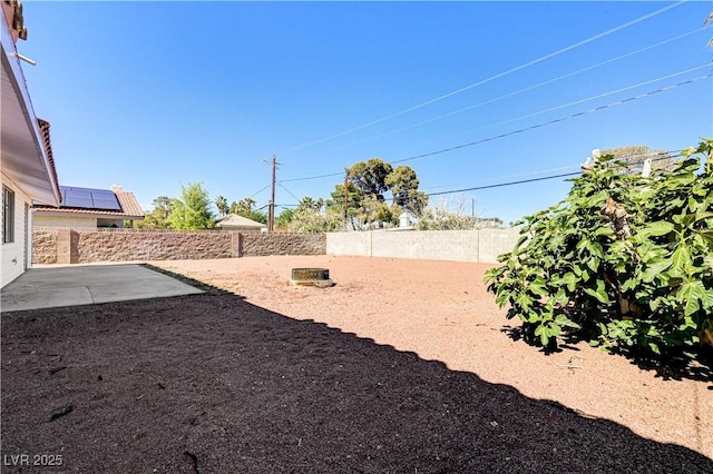 1620 Yellow Rose St, Las Vegas, NV 89108 - fenced backyard with a patio