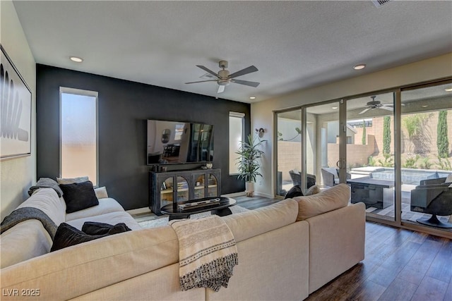 8335 Beaten Path Ct, Las Vegas, NV 89166 - living room with ceiling fan, healthy amount of natural light, wood finished floors, and recessed lighting