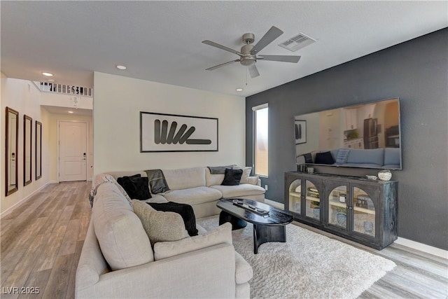 8335 Beaten Path Ct, Las Vegas, NV 89166 - living room featuring wood finished floors, ceiling fan, recessed lighting, and baseboards