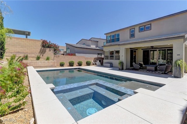 8335 Beaten Path Ct, Las Vegas, NV 89166 - view of pool with a fenced backyard, a patio, outdoor lounge area, a ceiling fan, and a pool with connected hot tub