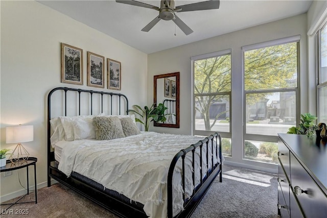 8335 Beaten Path Ct, Las Vegas, NV 89166 - carpeted bedroom featuring baseboards and a ceiling fan