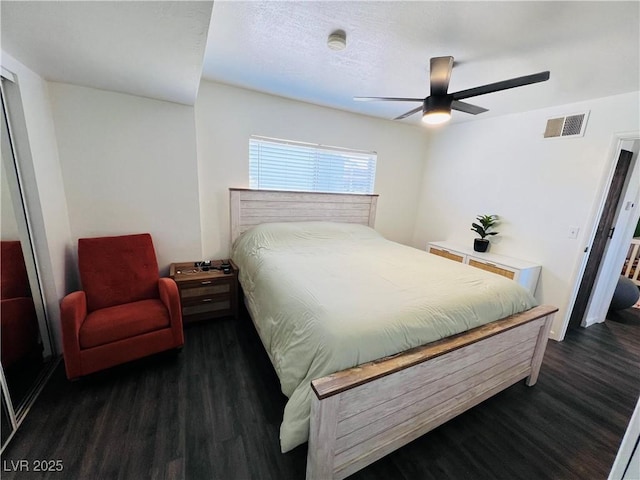 bedroom featuring wood finished floors and a ceiling fan