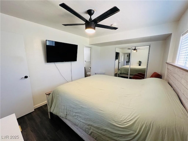 bedroom featuring dark wood finished floors, ceiling fan, and a closet