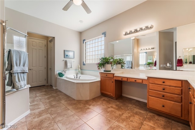 8125 Soledad Canyon St, Las Vegas, NV 89131 - full bath featuring ceiling fan, vanity, a garden tub, a shower stall, and tile patterned floors
