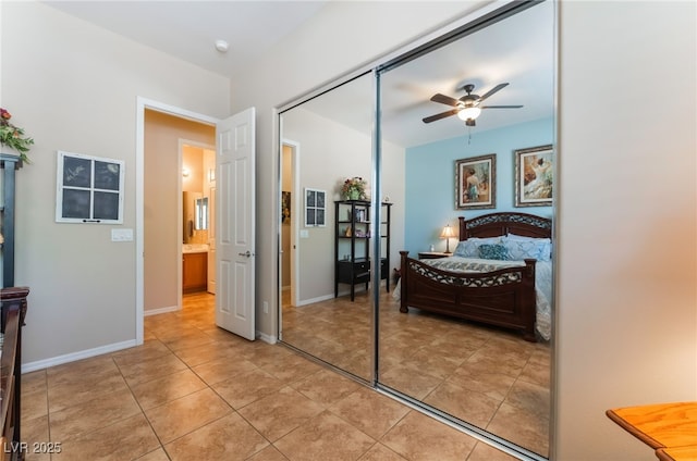 8125 Soledad Canyon St, Las Vegas, NV 89131 - bedroom with light tile patterned flooring, baseboards, and a ceiling fan