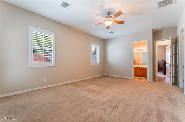 8125 Soledad Canyon St, Las Vegas, NV 89131 - unfurnished bedroom with multiple windows, light carpet, and baseboards