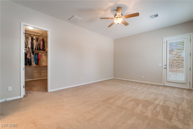8125 Soledad Canyon St, Las Vegas, NV 89131 - spare room with ceiling fan, light carpet, and baseboards
