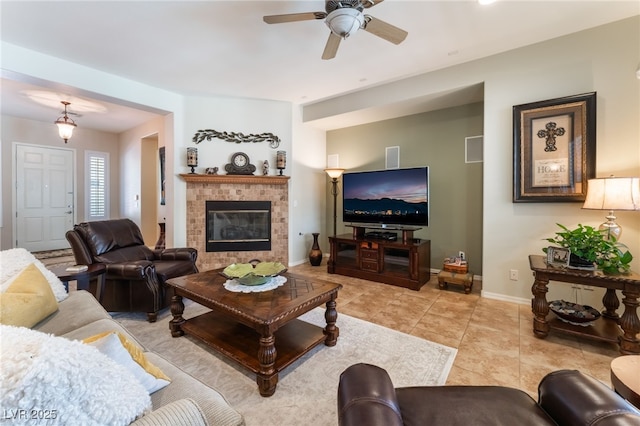 8125 Soledad Canyon St, Las Vegas, NV 89131 - living area with a ceiling fan, a tile fireplace, baseboards, and light tile patterned floors