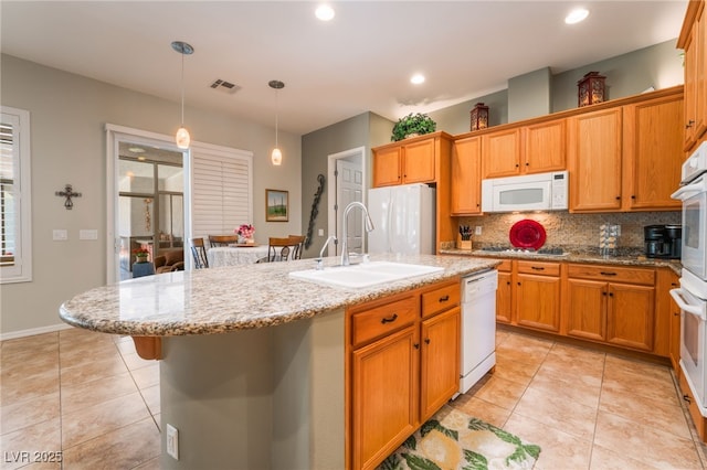 8125 Soledad Canyon St, Las Vegas, NV 89131 - kitchen featuring white appliances, a sink, backsplash, light tile patterned floors, and recessed lighting
