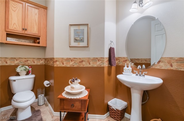 8125 Soledad Canyon St, Las Vegas, NV 89131 - half bathroom featuring toilet and a sink