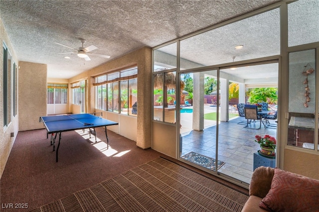 8125 Soledad Canyon St, Las Vegas, NV 89131 - rec room featuring healthy amount of natural light, ceiling fan, a textured ceiling, and carpet floors