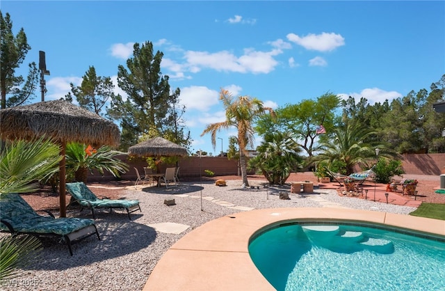 8125 Soledad Canyon St, Las Vegas, NV 89131 - view of swimming pool featuring a fenced backyard and a patio area