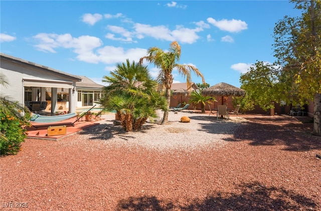 8125 Soledad Canyon St, Las Vegas, NV 89131 - fenced backyard featuring a patio area