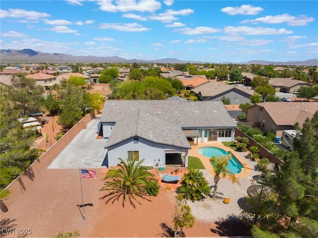 8125 Soledad Canyon St, Las Vegas, NV 89131 - aerial perspective of suburban area with mountains and a pool