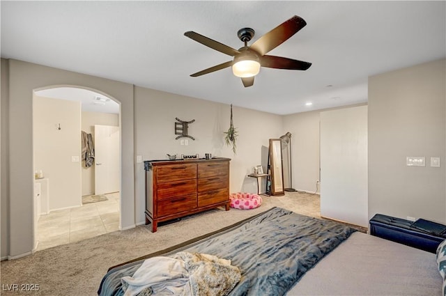 9327 S Chieftain St, Las Vegas, NV 89178 - carpeted bedroom featuring arched walkways and ceiling fan