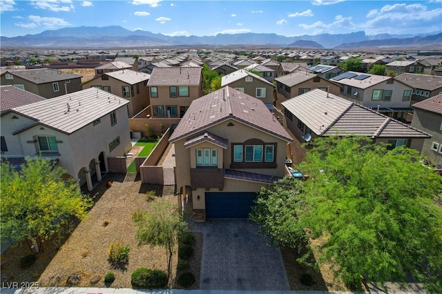 9327 S Chieftain St, Las Vegas, NV 89178 - aerial view of residential area with a mountainous background