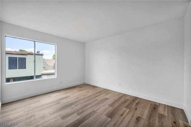 1424 Santa Anita Dr Unit D, Las Vegas, NV 89119 - unfurnished room with wood finished floors and baseboards