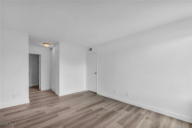 1424 Santa Anita Dr Unit D, Las Vegas, NV 89119 - unfurnished room with wood finished floors and baseboards