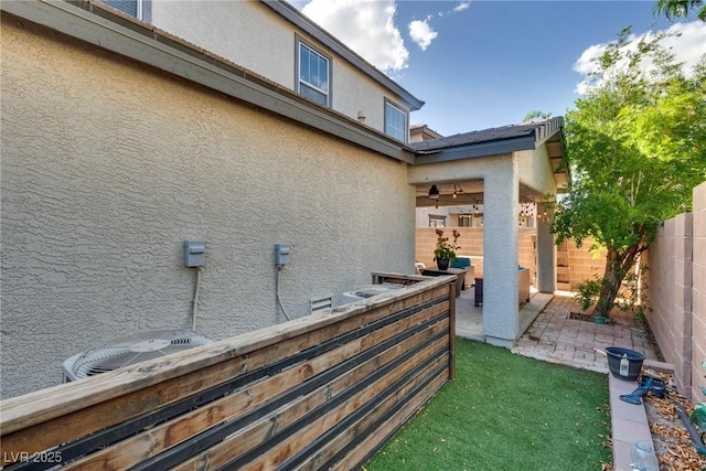 680 Moonlight Stroll St, Henderson, NV 89002 - fenced backyard with a patio and central AC