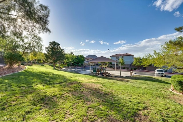 680 Moonlight Stroll St, Henderson, NV 89002 - view of grassy yard with a gazebo
